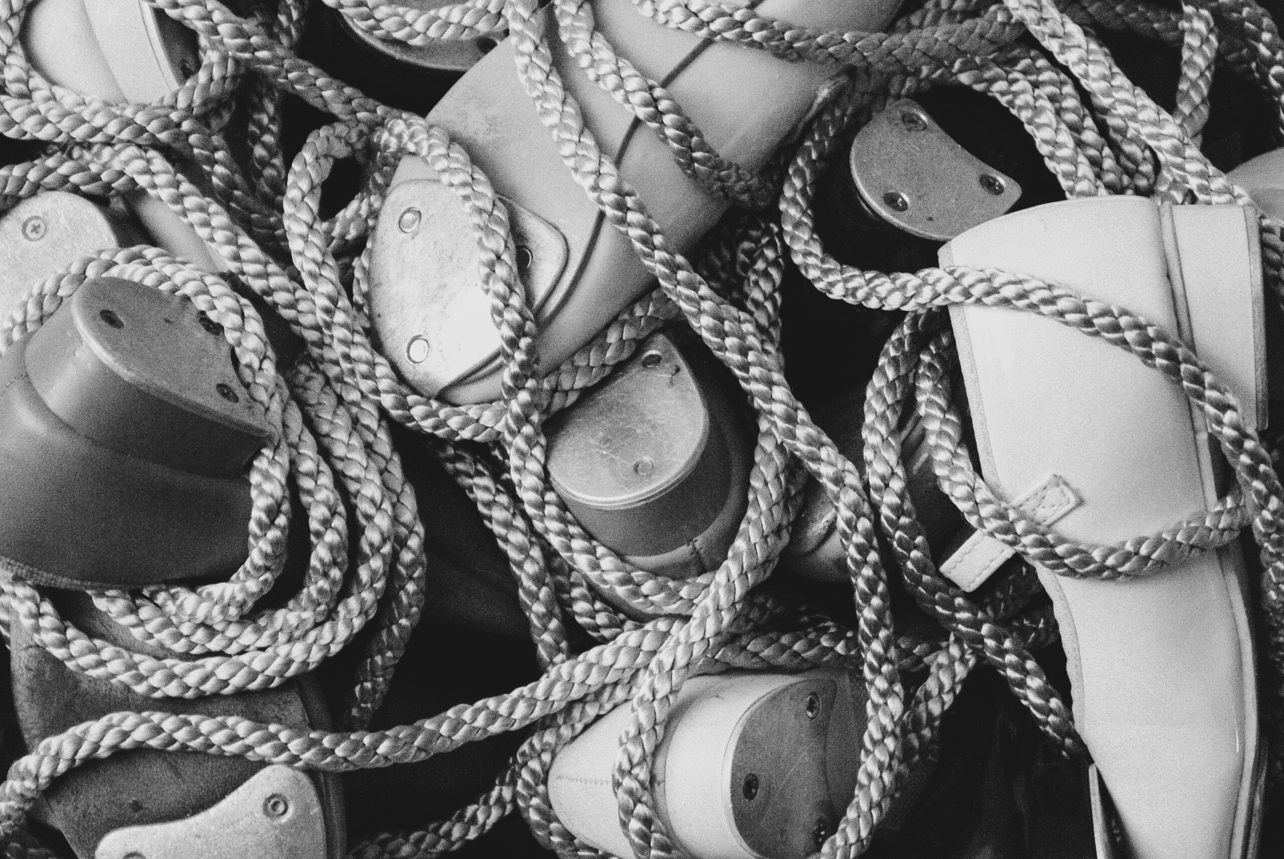Small tap shoes tied with thread.